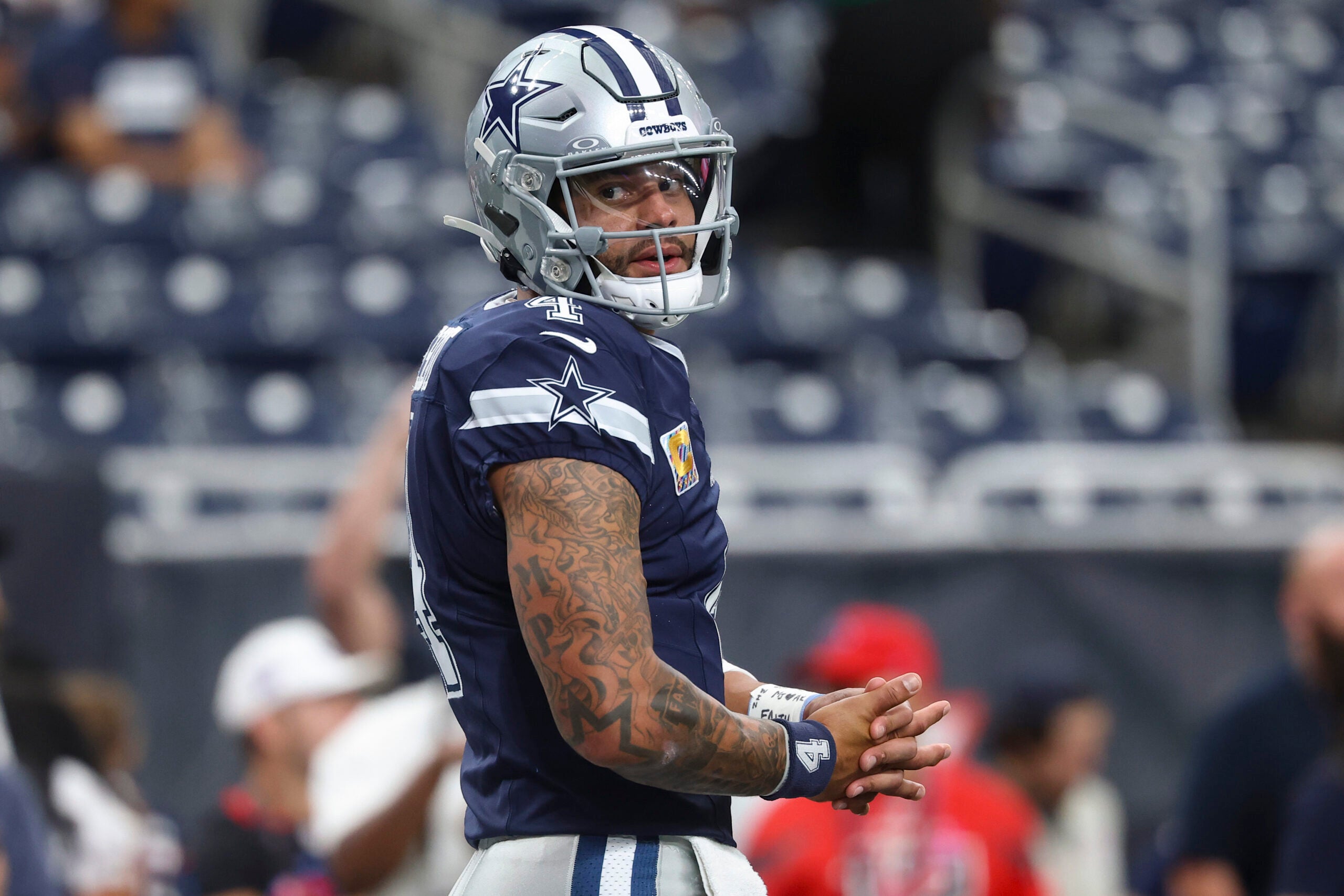 Oct 4, 2026; Houston, Texas, USA; Dallas Cowboys quarterback Dak Prescott (4) on the field before the game against the Houston Texans at Reliant Stadium.