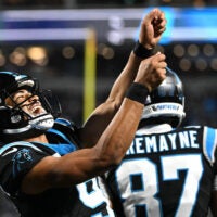 Oct 4, 2026; Charlotte, North Carolina, USA; Carolina Panthers quarterback Bryce Young (9) celebrates after a touchdown by wide receiver Tetairoa McMillan (not pictured) against the Detroit Lions during the third quarter at Bank of America Stadium.