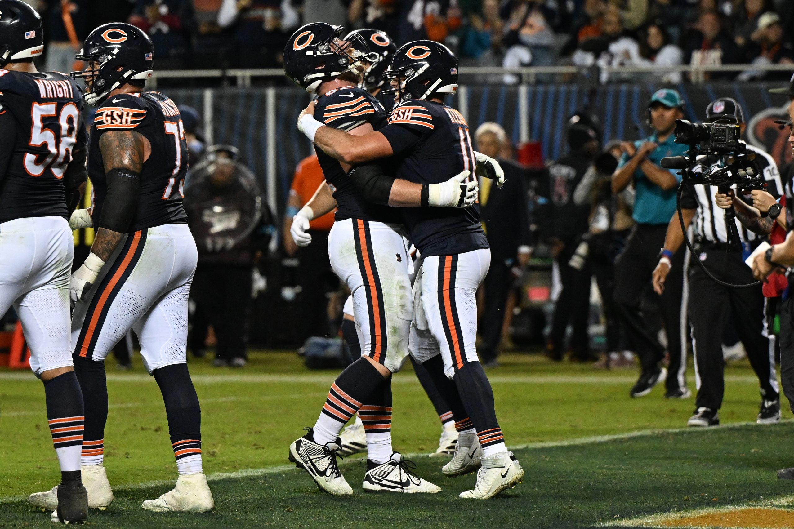 Sep 28, 2026; Chicago, Illinois, USA; Chicago Bears quarterback Case Keenum (11) celebrates with guard Joe Thuney (62) after he scores a touchdown against the Philadelphia Eagles during the second half at Soldier Field.