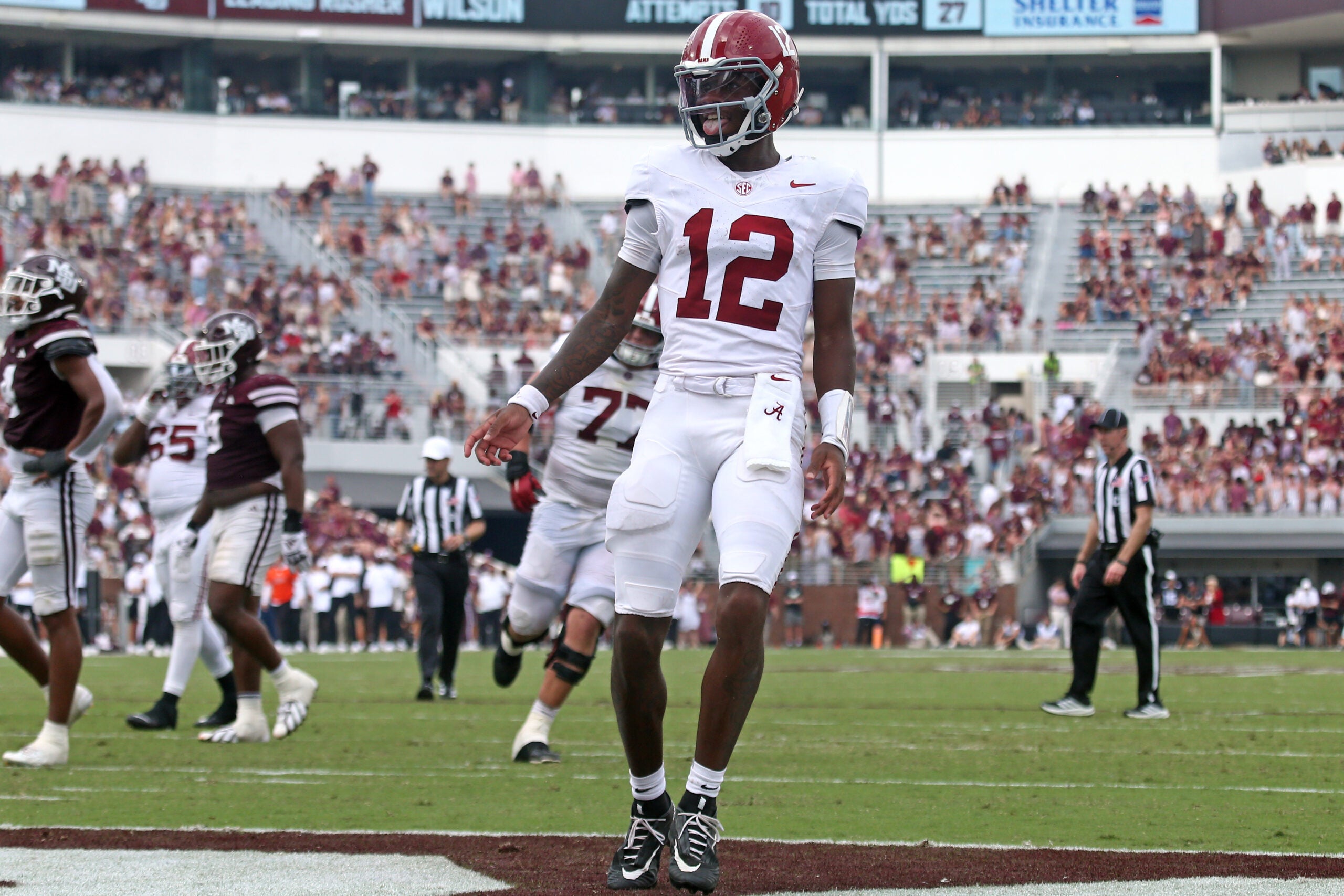 Oct 3, 2026; Starkville, Mississippi, USA; Alabama Crimson Tide quarterback Keelon Russell (12) reacts after a touchdown during the fourth quarter against the Mississippi State Bulldogs at Davis Wade Stadium at Scott Field.
