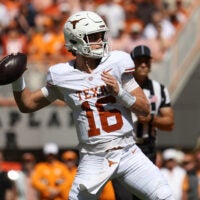 Sep 26, 2026; Knoxville, Tennessee, USA; Texas Longhorns quarterback Arch Manning (16) passes Tennessee Volunteers during the first half at Neyland Stadium.