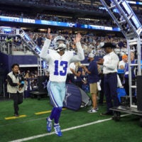 Oct 8, 2026; Arlington, Texas, USA; Dallas Cowboys safety Caleb Downs (13) takes the field before the game at AT&T Stadium.