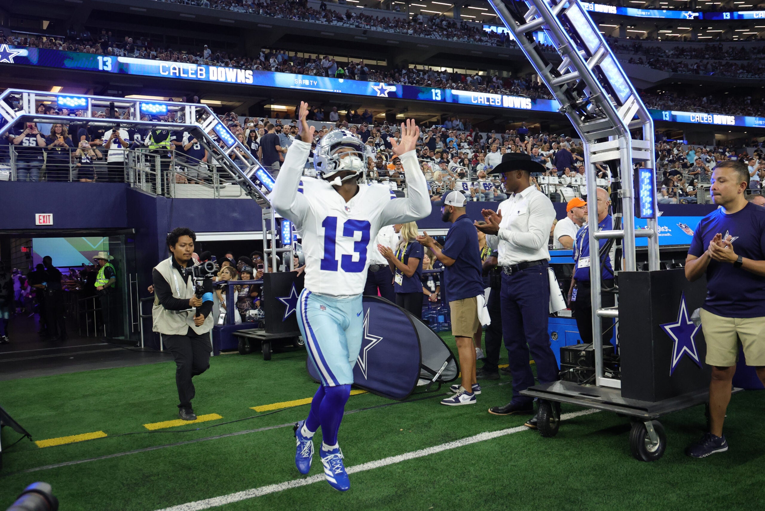 Oct 8, 2026; Arlington, Texas, USA; Dallas Cowboys safety Caleb Downs (13) takes the field before the game at AT&T Stadium.