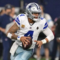Oct 8, 2026; Arlington, Texas, USA; Dallas Cowboys quarterback Dak Prescott (4) drops back to pass in the first half against the Tampa Bay Buccaneers at AT&T Stadium.