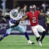 Oct 8, 2026; Arlington, Texas, USA; Dallas Cowboys cornerback DaRon Bland (26) attempts to make an interception against Tampa Bay Buccaneers wide receiver Emeka Egbuka (2) at AT&T Stadium.