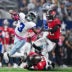 Oct 8, 2026; Arlington, Texas, USA; Tampa Bay Buccaneers cornerback Keionte Scott (22) and safety Ifeatu Melifonwu (5) tackle Dallas Cowboys wide receiver George Pickens (3) during the game between the Cowboys and the Buccaneers at AT&T Stadium.