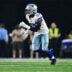Oct 8, 2026; Arlington, Texas, USA; Dallas Cowboys linebacker Malachi Lawrence (57) rushes the line during the game between the Cowboys and the Buccaneers at AT&T Stadium.