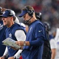 Oct 8, 2026; Arlington, Texas, USA; Dallas Cowboys head coach Brian Schottenheimer looks on during the game between the Cowboys and the Buccaneers at AT&T Stadium.