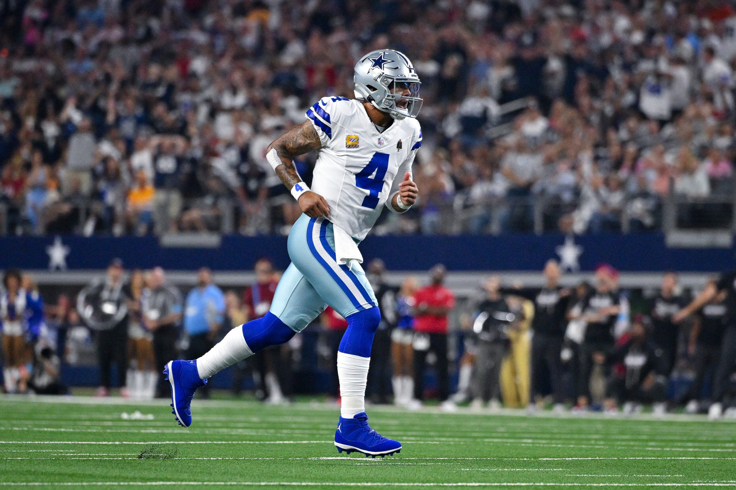 Oct 8, 2026; Arlington, Texas, USA; Dallas Cowboys quarterback Dak Prescott (4) celebrates during the game between the Cowboys and the Buccaneers at AT&T Stadium.