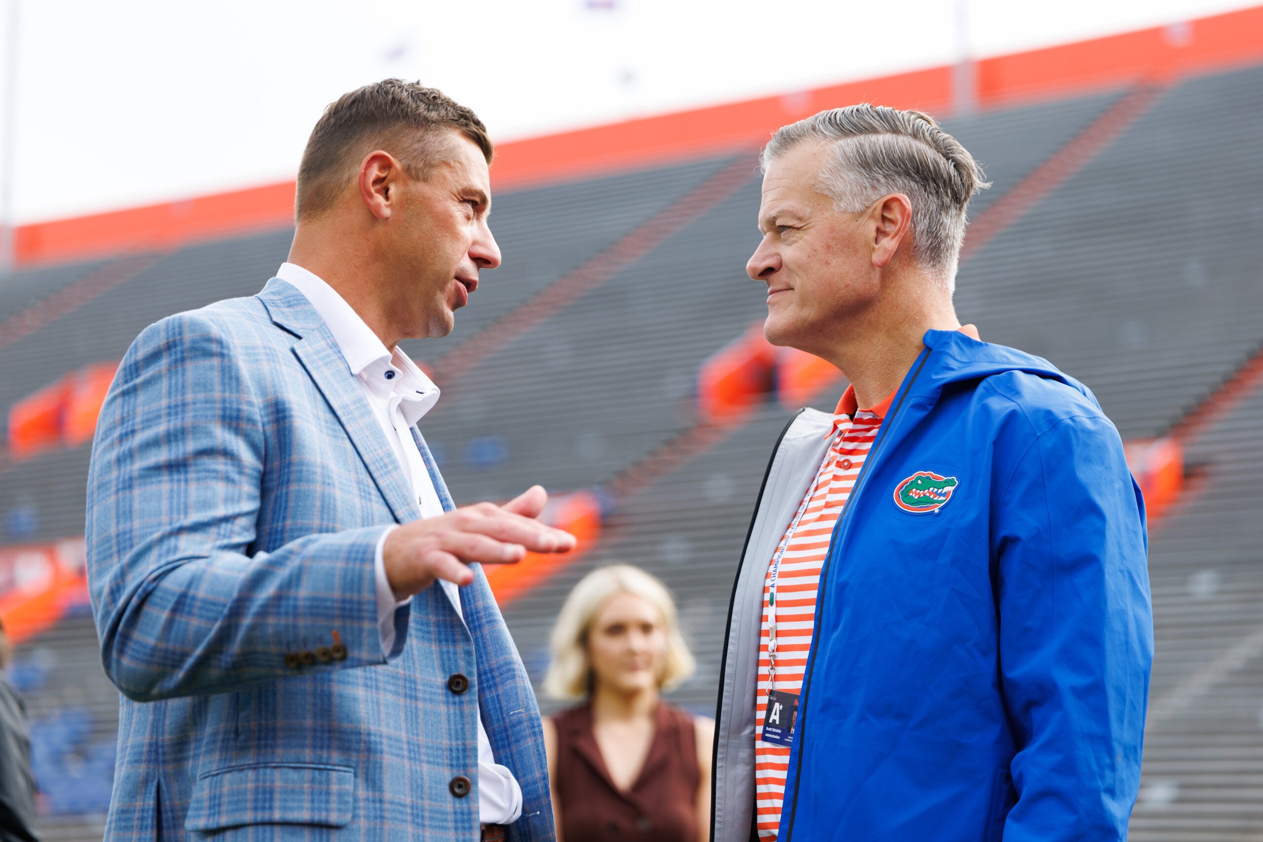 Oct 10, 2026; Gainesville, Florida, USA; Florida Gators head coach Jon Sumrall and Florida Gators athletic director Scott Stricklin talk before a game against the South Carolina Gamecocks at Ben Hill Griffin Stadium.