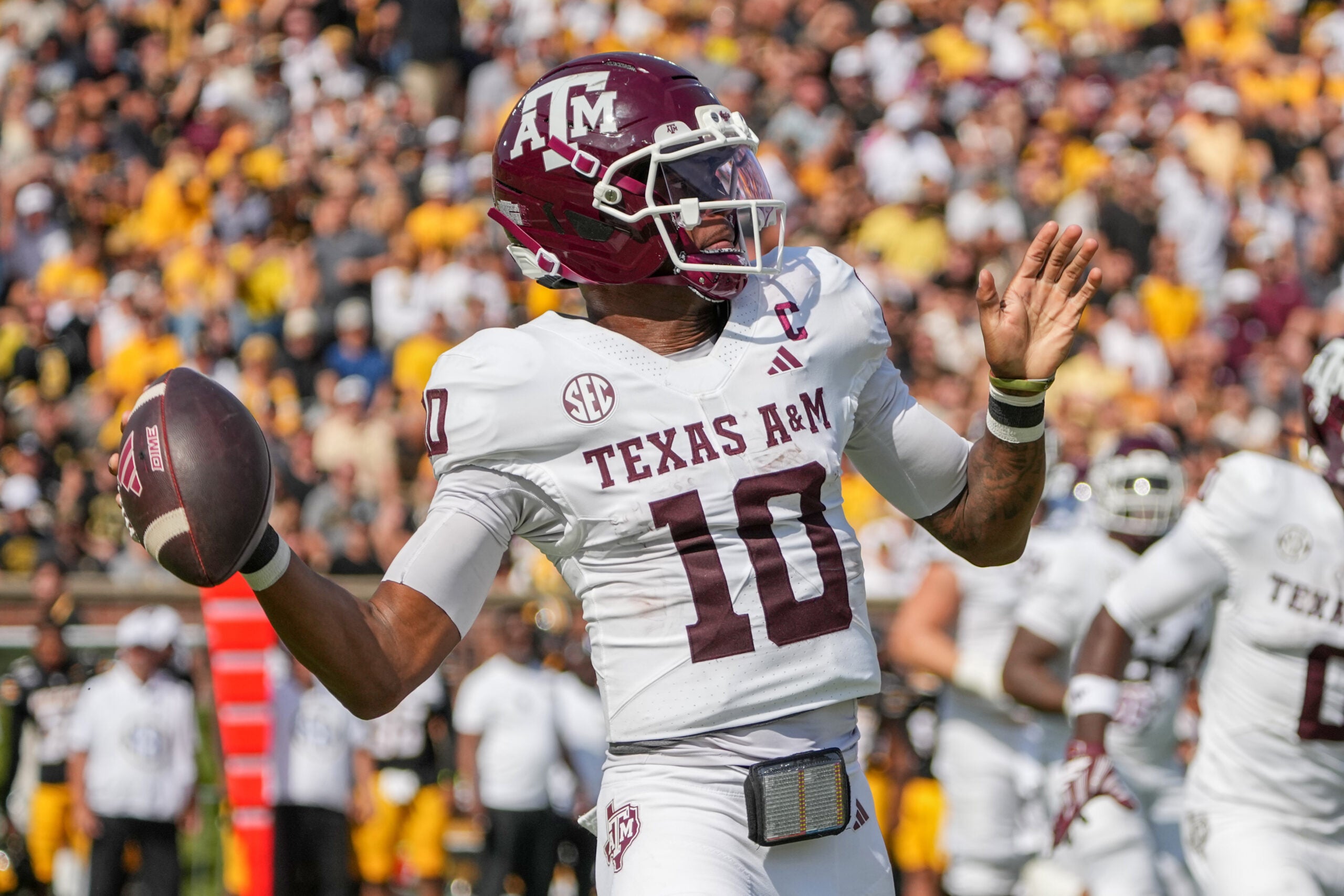 Oct 10, 2026; Columbia, Missouri, USA; Texas A&M Aggies quarterback Marcel Reed (10) throws a pass against the Missouri Tigers during the first half of the game at Faurot Field at Memorial Stadium.