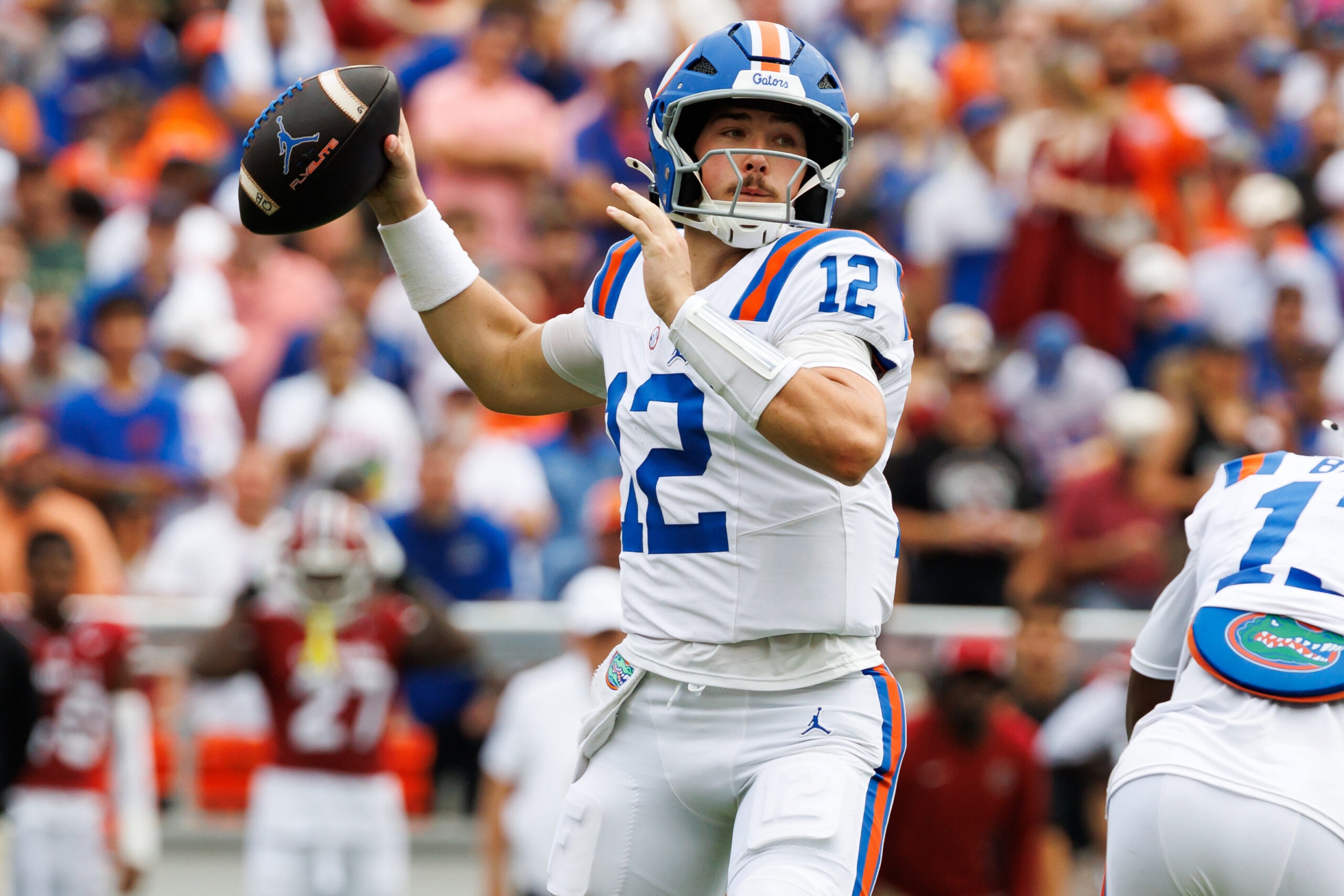 Oct 10, 2026; Gainesville, Florida, USA; Florida Gators quarterback Aaron Philo (12) throws the ball against the South Carolina Gamecocks during the first half at Ben Hill Griffin Stadium.