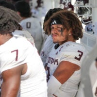 Oct 10, 2026; Columbia, Missouri, USA; Texas A&M Aggies linebacker TJ Smith (30) reacts on the bench against the Missouri Tigers during the second half of the game at Faurot Field at Memorial Stadium.