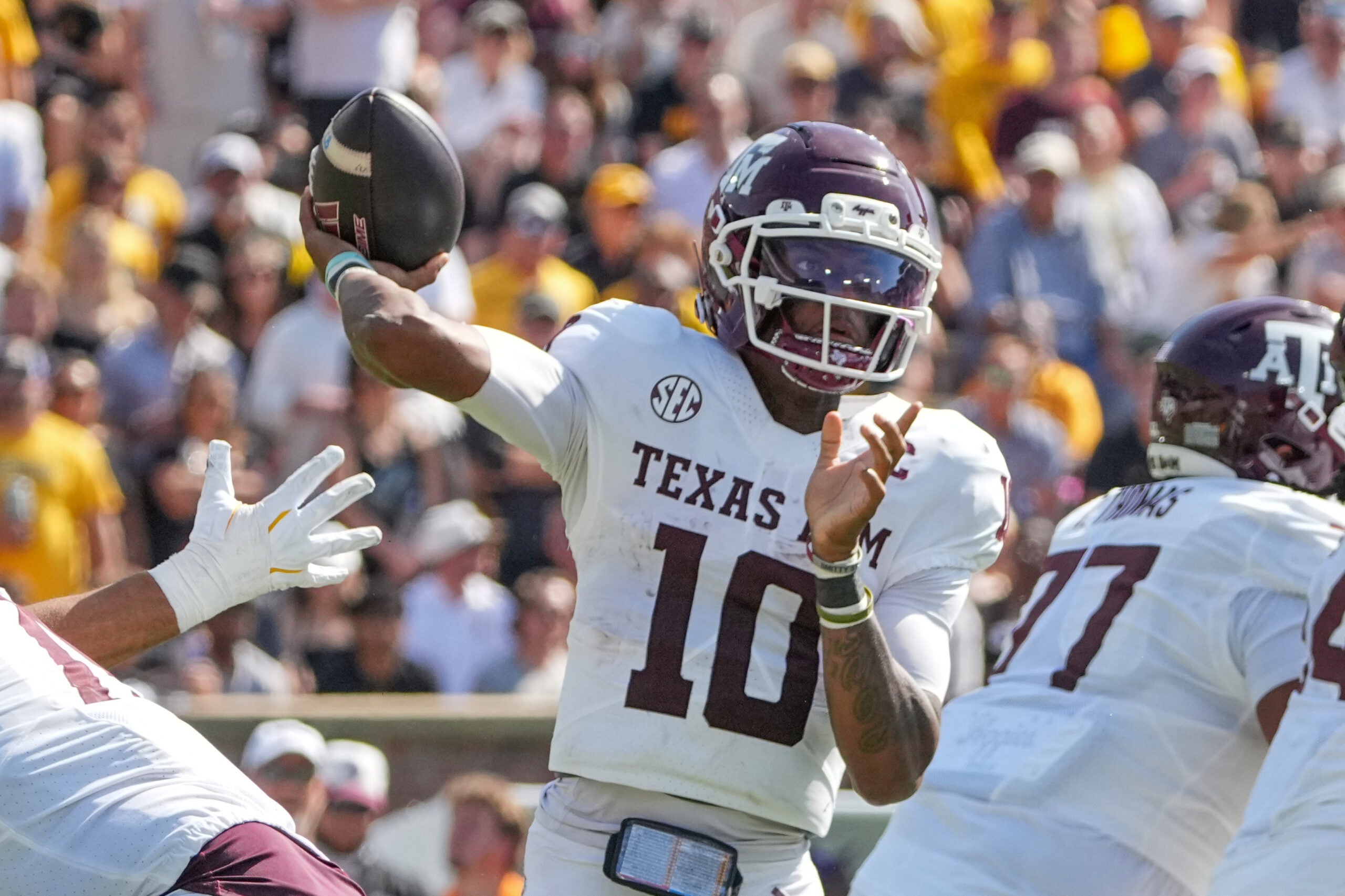Oct 10, 2026; Columbia, Missouri, USA; Texas A&M Aggies quarterback Marcel Reed (10) throws a pass against the Missouri Tigers during the second half of the game at Faurot Field at Memorial Stadium.