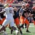 OSU quarterback Drew Mestemaker (17) hands off the ball to OSU running back Caleb Hawkins (24) in the third quarter during an NCAA football game between the Oklahoma State University (OSU) Cowboys and the University of Central Florida (UCF) Knights at Boone Pickens Stadium in Stillwater, Okla., on Saturday, Oct. 10, 2026.