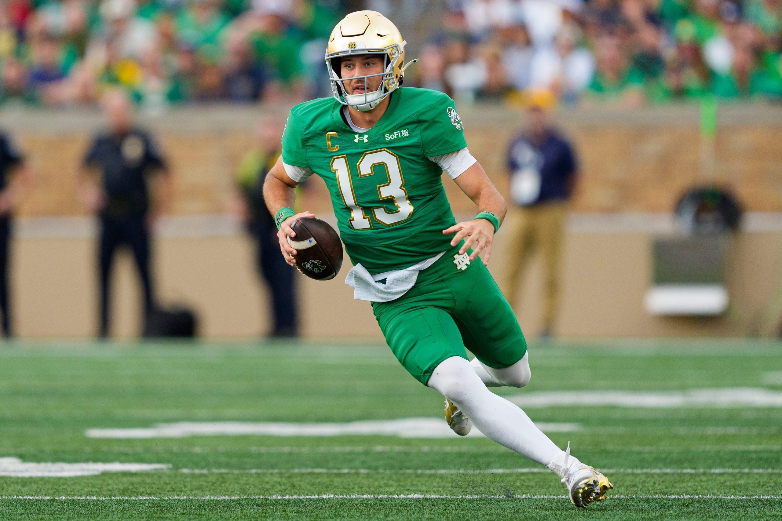 Notre Dame quarterback CJ Carr scrambles with the ball during a NCAA football game against Stanford at Notre Dame Stadium on Saturday, Oct. 10, 2026, in South Bend.