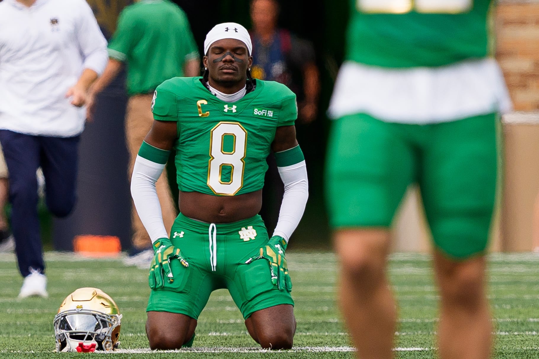 Notre Dame safety Adon Shuler (8) prays on the field before a NCAA football game against Stanford at Notre Dame Stadium on Saturday, Oct. 10, 2026, in South Bend.