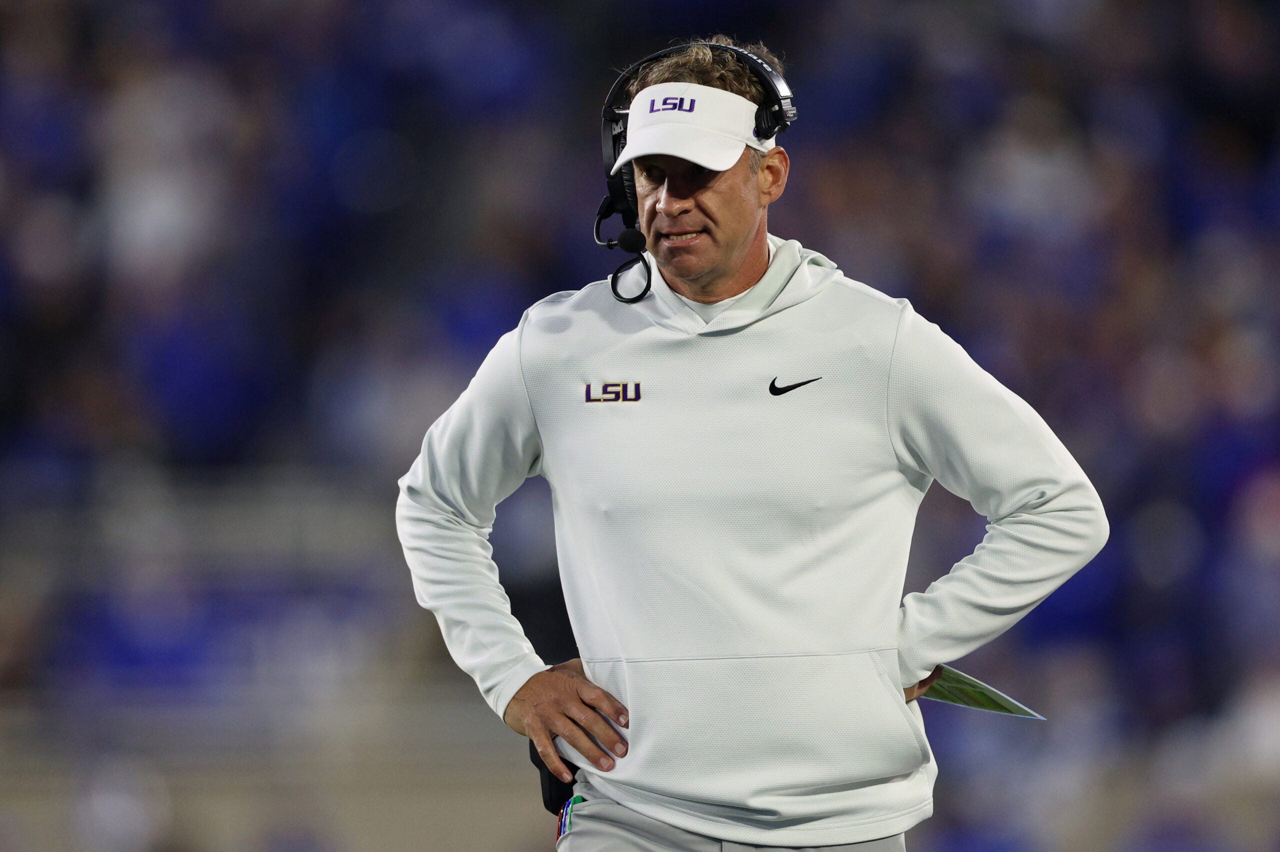 Oct 10, 2026; Lexington, Kentucky, USA; LSU Tigers head coach Lane Kiffin walks on the sideline during the first quarter against the Kentucky Wildcats at Kroger Field.