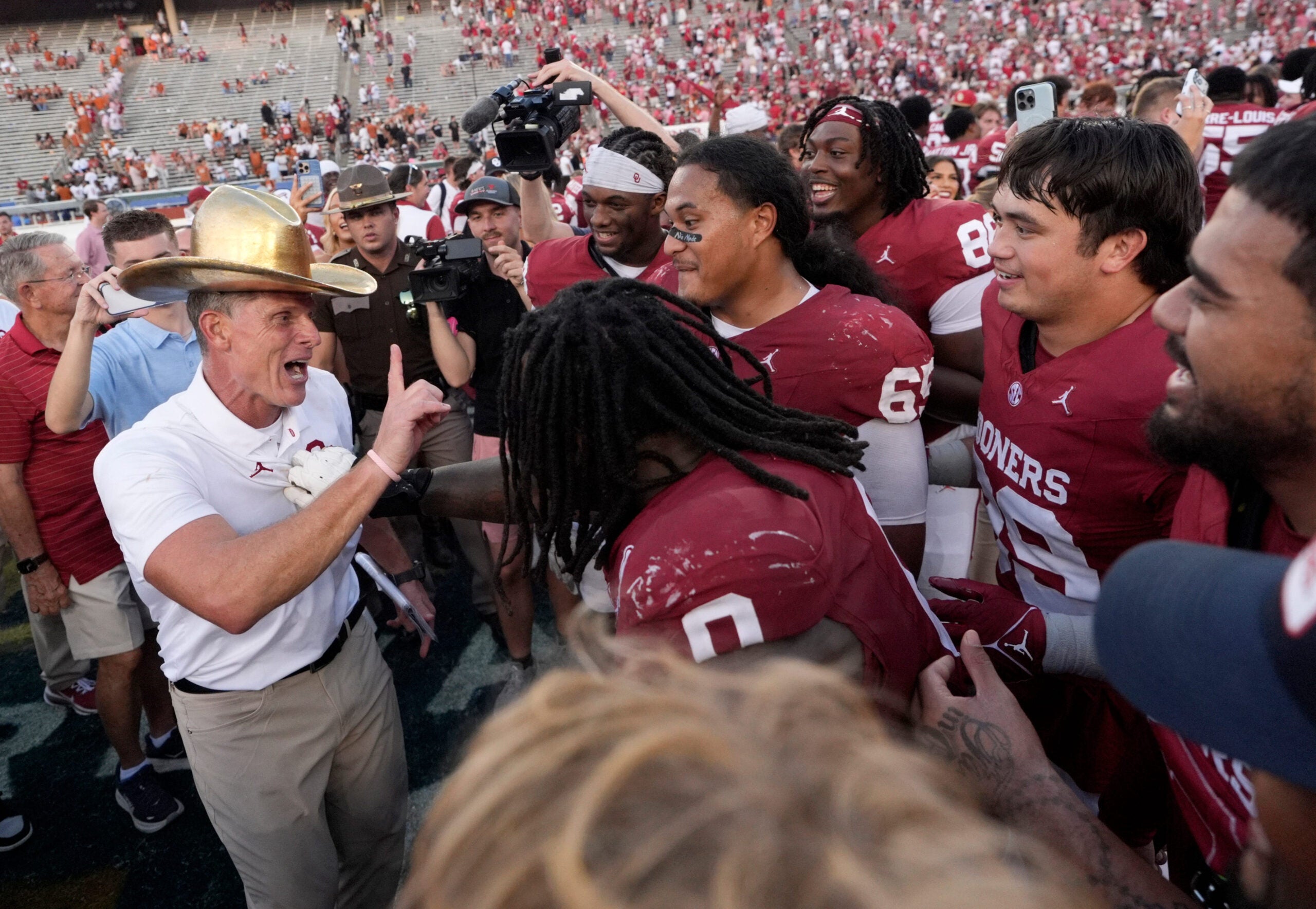 Oklahoma Sooners head coach Brent Venables beating Texas Longhorns