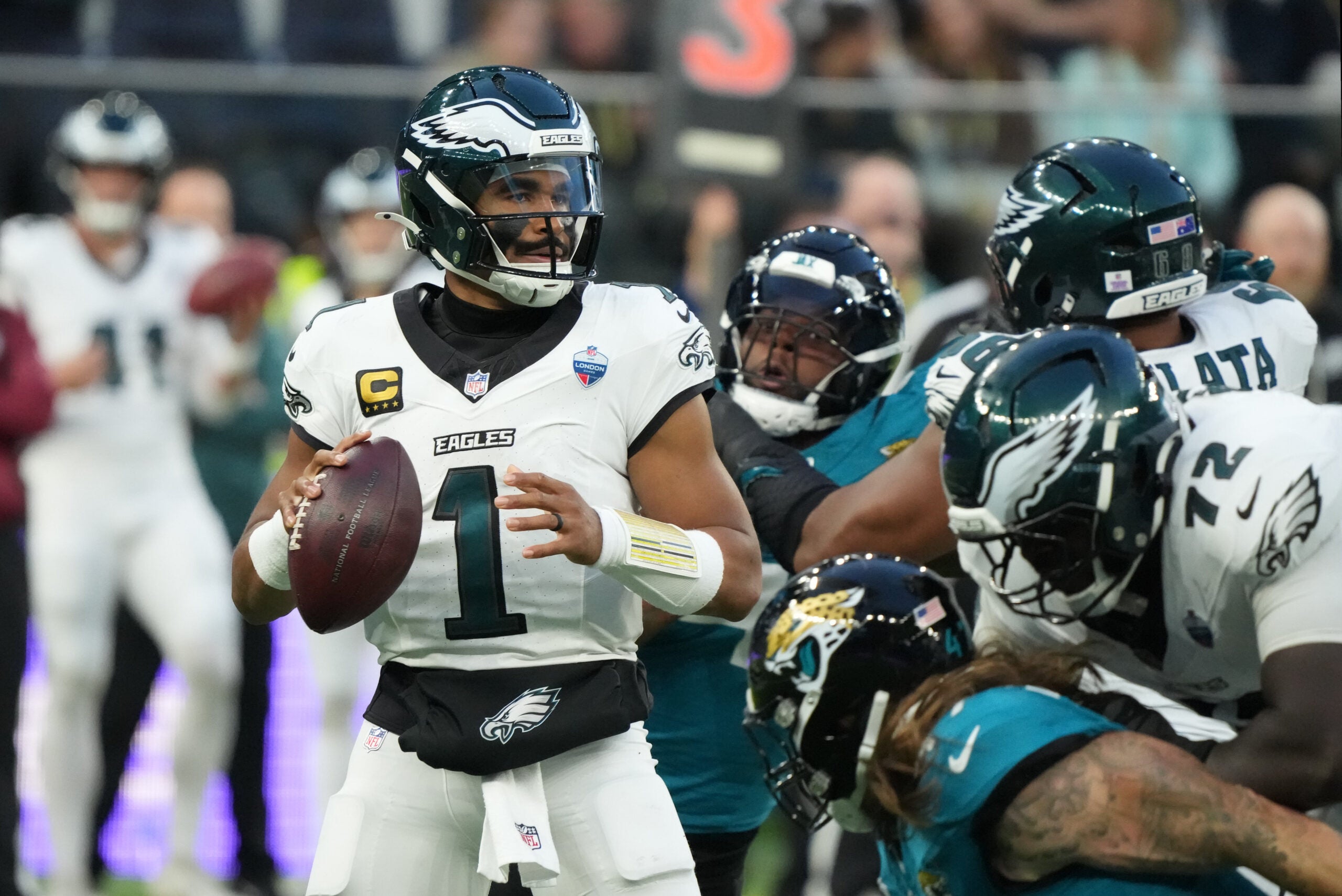Oct 11, 2026; Tottenham, ENG; Philadelphia Eagles quarterback Jalen Hurts (1) looks to pass during the second half against the Jacksonville Jaguars at Tottenham Hotspur Stadium.