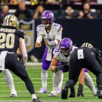 Oct 11, 2026; New Orleans, Louisiana, USA; Minnesota Vikings quarterback Kyler Murray (1) calls for the ball against New Orleans Saints linebacker Pete Werner (20) during the first half at Caesars Superdome.