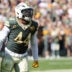 Oct 11, 2026; Green Bay, Wisconsin, USA; Green Bay Packers linebacker Zaire Franklin (44) reacts after a play against the Chicago Bears during the second quarter at Lambeau Field.