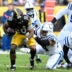 Oct 11, 2026; Pittsburgh, Pennsylvania, USA; Pittsburgh Steelers running back Jaylen Warren (30) is tackled by Indianapolis Colts defensive tackle Jerry Tillery (94) in the second quarter at Acrisure Stadium.