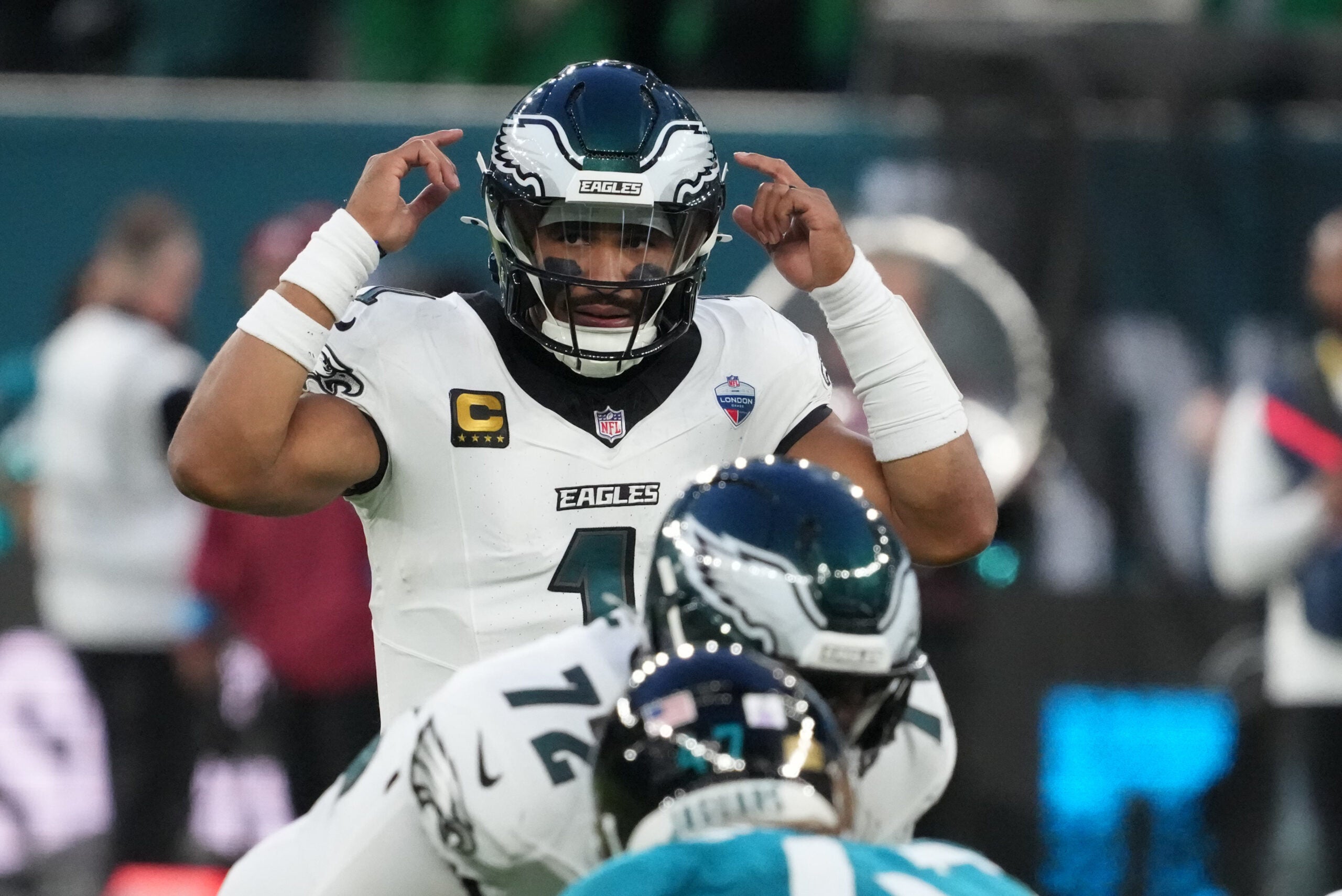 Oct 11, 2026; Tottenham, ENG; Philadelphia Eagles quarterback Jalen Hurts (1) signals during the second half against the Jacksonville Jaguars at Tottenham Hotspur Stadium.