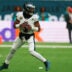 Oct 11, 2026; Tottenham, ENG; Philadelphia Eagles quarterback Jalen Hurts (1) drops back to pass during the second half against the Jacksonville Jaguars at Tottenham Hotspur Stadium.