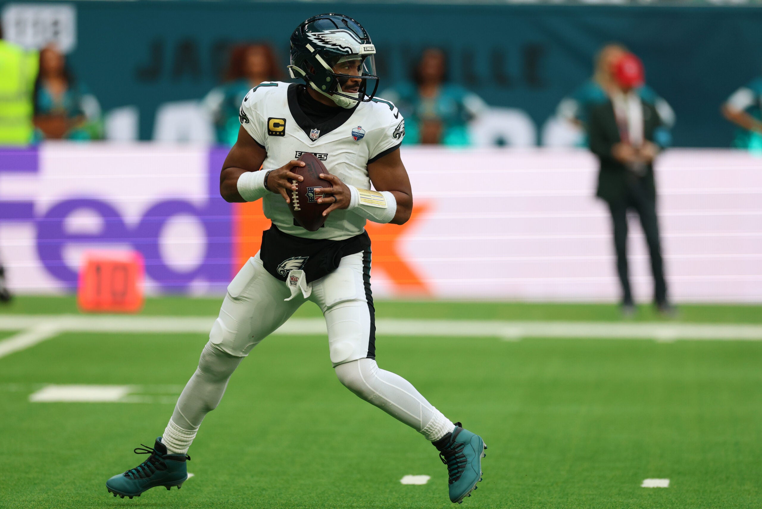 Oct 11, 2026; Tottenham, ENG; Philadelphia Eagles quarterback Jalen Hurts (1) drops back to pass during the second half against the Jacksonville Jaguars at Tottenham Hotspur Stadium.