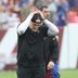 Oct 11, 2026; Landover, Maryland, USA; Washington Commanders head coach Dan Quinn reacts after the game against the New York Giants at Northwest Stadium.