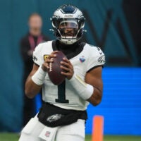 Oct 11, 2026; Tottenham, ENG; Philadelphia Eagles quarterback Jalen Hurts (1) drops back to pass during the second half against the Jacksonville Jaguars at Tottenham Hotspur Stadium.