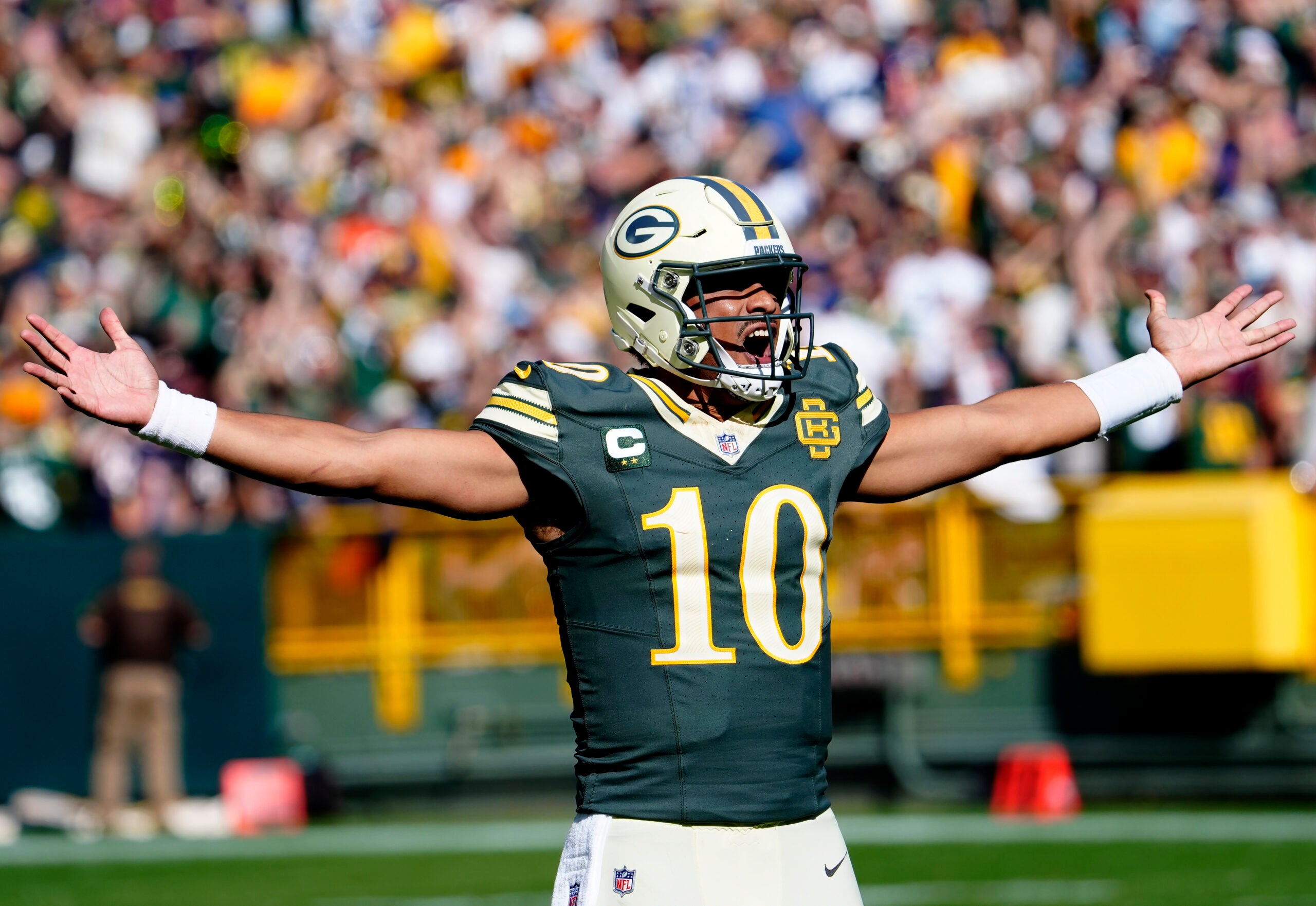 Oct 11, 2026; Green Bay, Wisconsin, USA; Green Bay Packers quarterback Jordan Love (10) celebrate thier win against the Chicago Bears duringthe game at Lambeau Field.