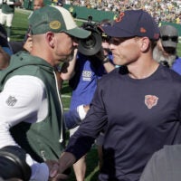 Oct 11, 2026; Green Bay, Wisconsin, USA; Green Bay Packers head coach Matt LaFleur and Chicago Bears head coach Ben Johnson shake hands following the game at Lambeau Field.