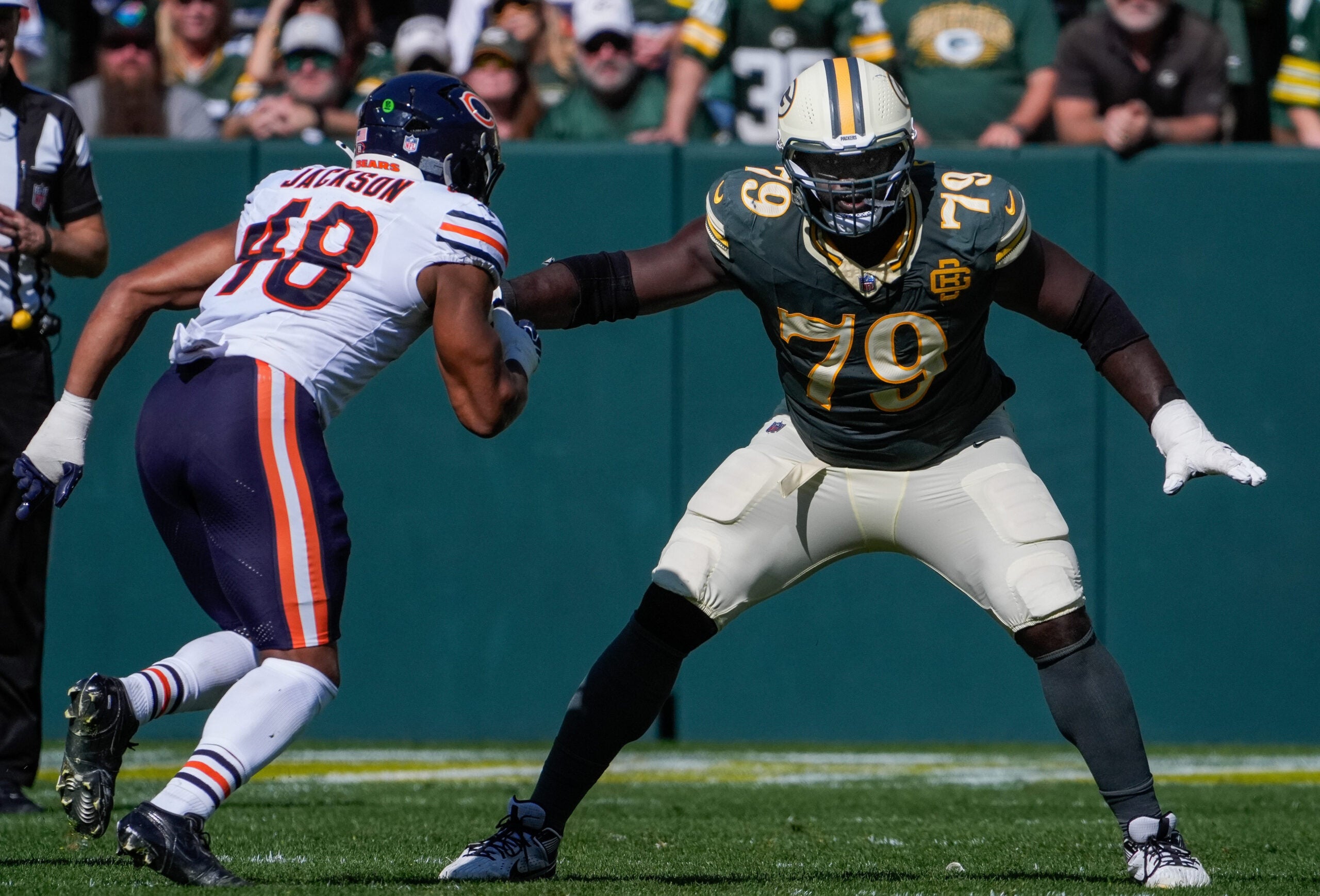 Green Bay Packers offensive tackle Travis Glover (79) blocks Chicago Bears linebacker D'Marco Jackson (48) on Sunday, Oct. 11, 2026, at Lambeau Field in Green Bay, Wisconsin.