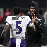 Oct 11, 2026; Atlanta, Georgia, USA; Baltimore Ravens quarterback Tyler Huntley (5) celebrates with quarterback Lamar Jackson (8) after a touchdown during overtime against the Atlanta Falcons at Mercedes-Benz Stadium.