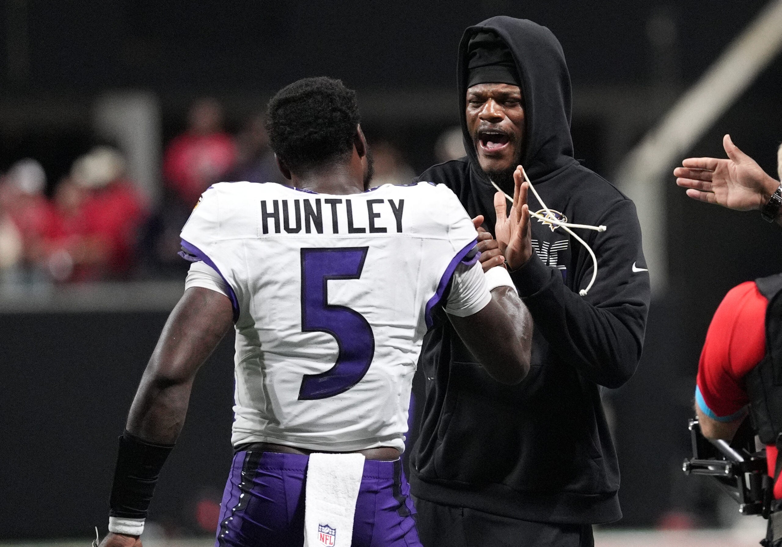Oct 11, 2026; Atlanta, Georgia, USA; Baltimore Ravens quarterback Tyler Huntley (5) celebrates with quarterback Lamar Jackson (8) after a touchdown during overtime against the Atlanta Falcons at Mercedes-Benz Stadium.