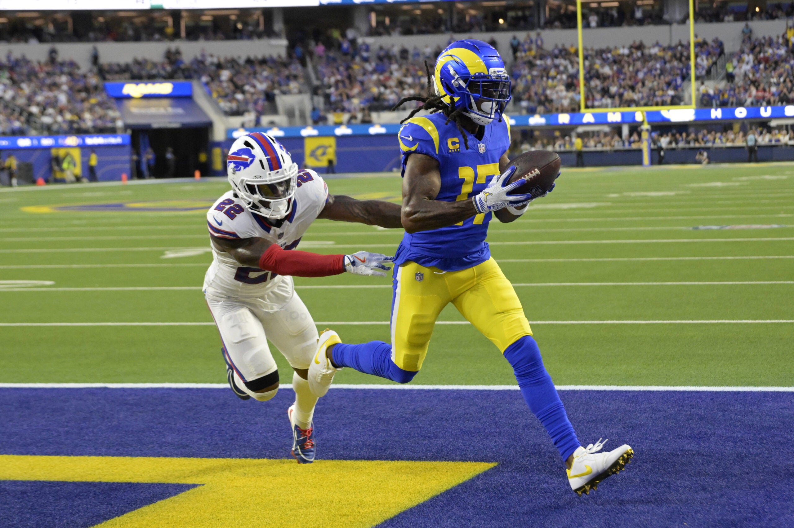 Oct 12, 2026; Inglewood, California, USA; Los Angeles Rams wide receiver Davante Adams (17) makes a catch for a touchdown as Buffalo Bills safety C.J. Gardner-Johnson (22) defends during the second quarter at SoFi Stadium.