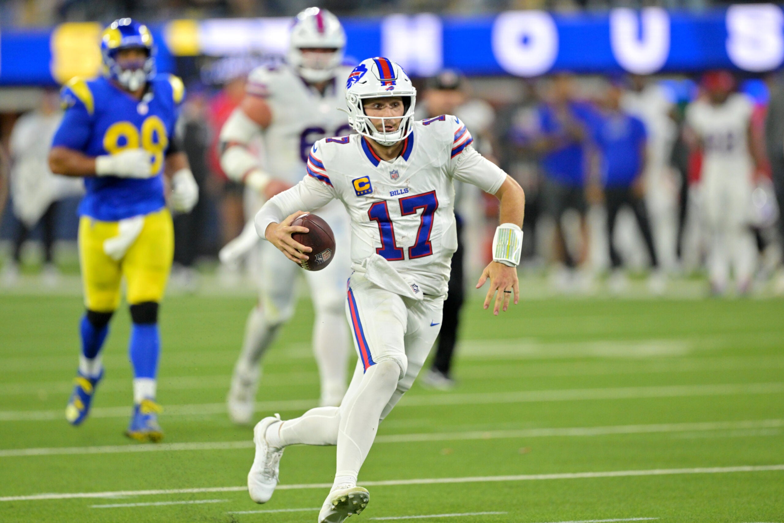 Oct 12, 2026; Inglewood, California, USA; Buffalo Bills quarterback Josh Allen (17) rushes during the fourth quarter against the Los Angeles Rams at SoFi Stadium.
