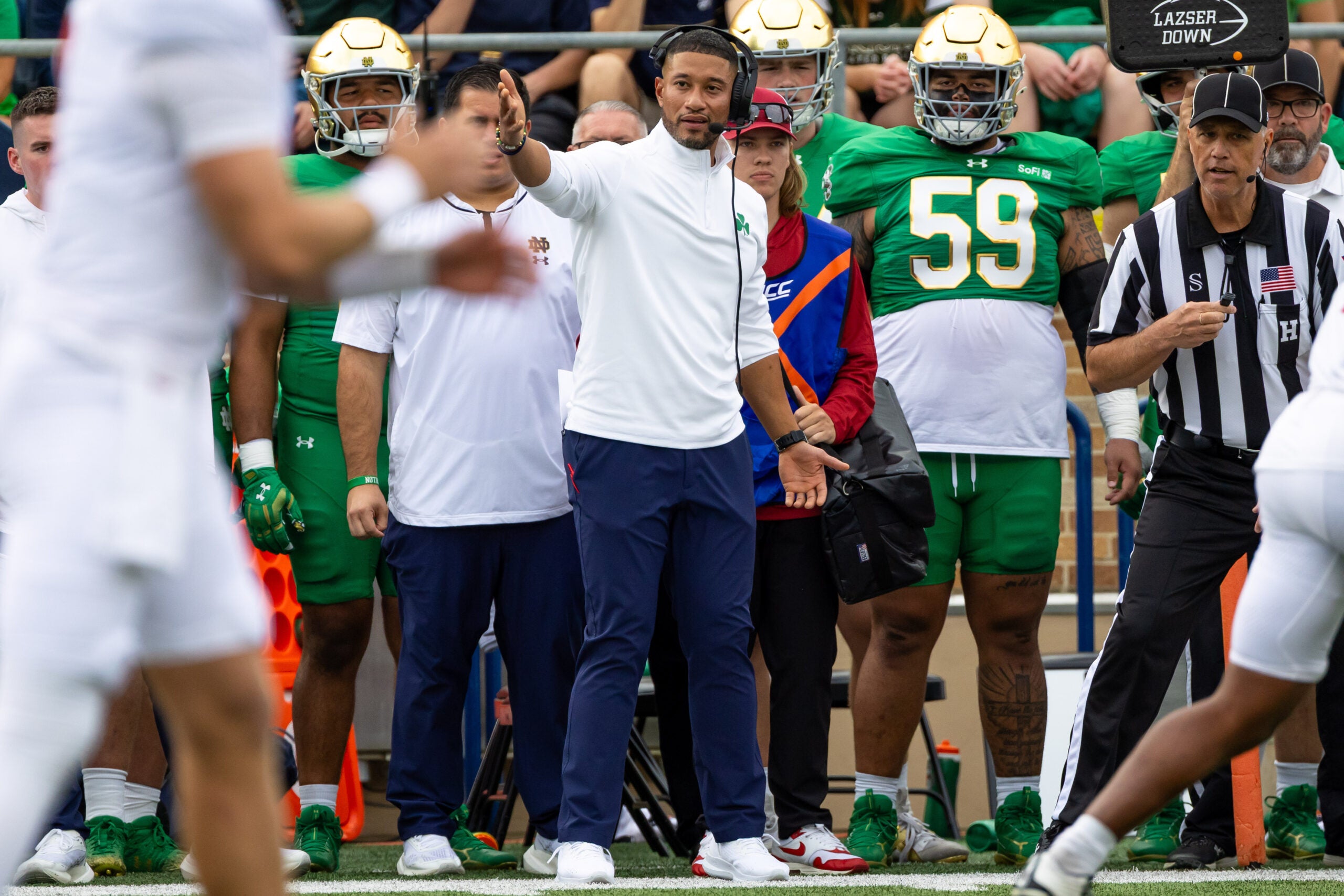 Oct 10, 2026; South Bend, Indiana, USA; Notre Dame Fighting Irish head coach Marcus Freeman gestures towards the field against the Stanford Cardinal during the first half at Notre Dame Stadium.