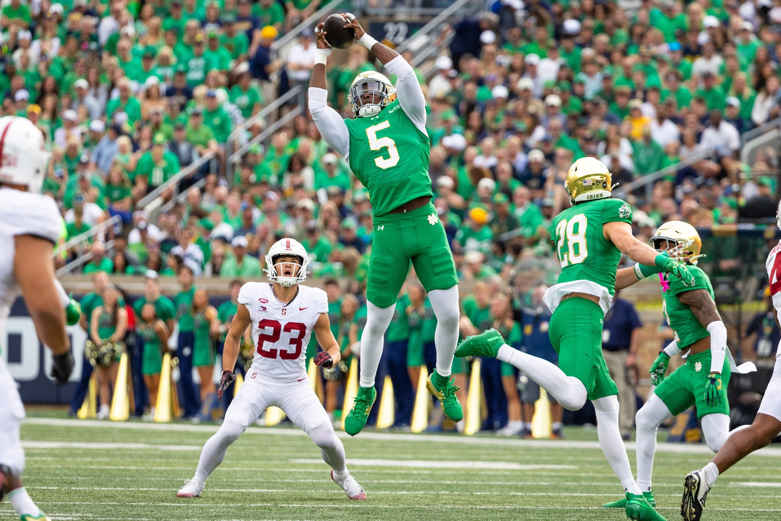 Oct 10, 2026; South Bend, Indiana, USA; Notre Dame Fighting Irish defensive lineman Boubacar Traore (5) intercepts a pass against the Stanford Cardinal during the first half at Notre Dame Stadium.