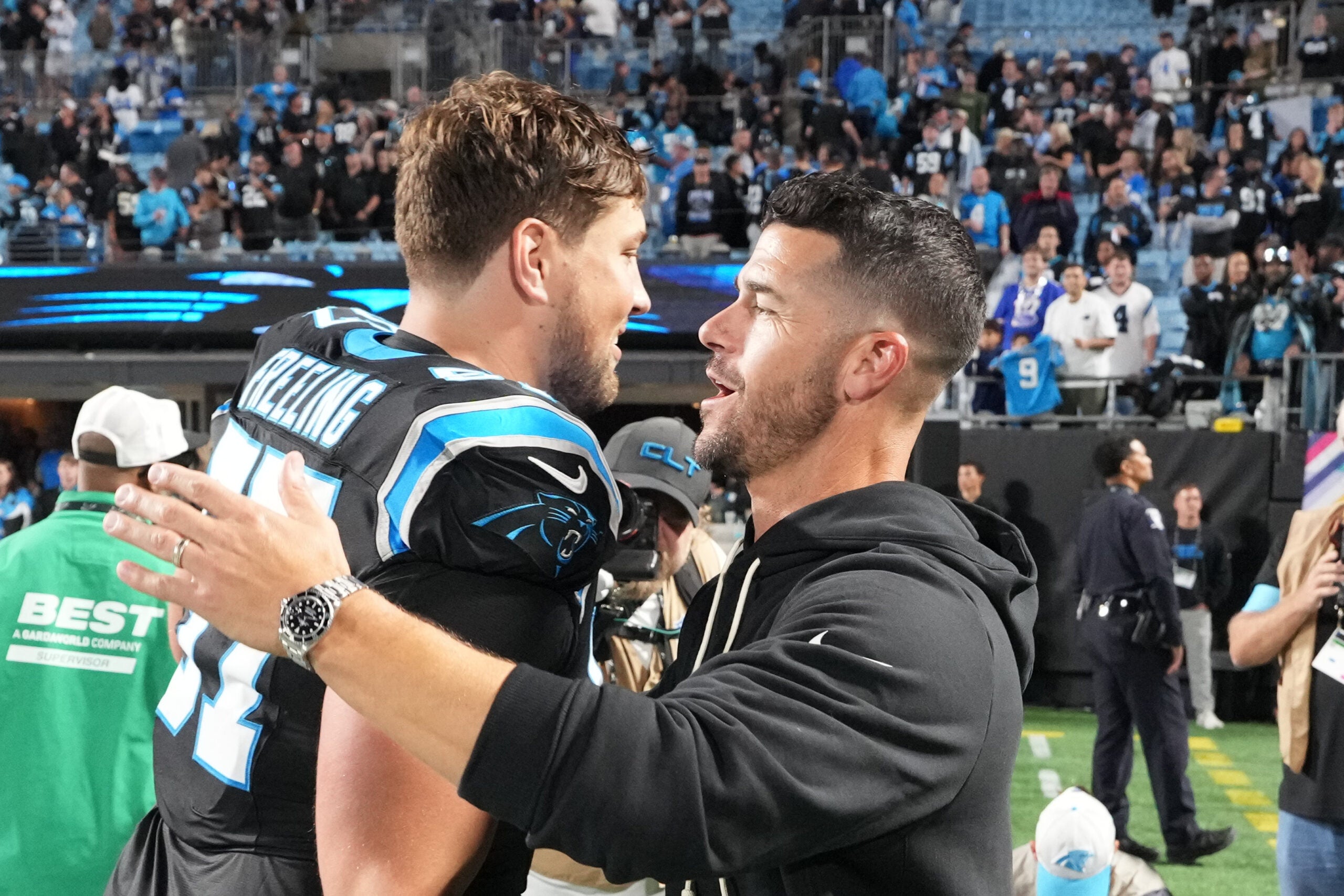 Oct 4, 2026; Charlotte, North Carolina, USA; Carolina Panthers head coach Dave Canales with offensive tackle Monroe Freeling (57) after the game at Bank of America Stadium.