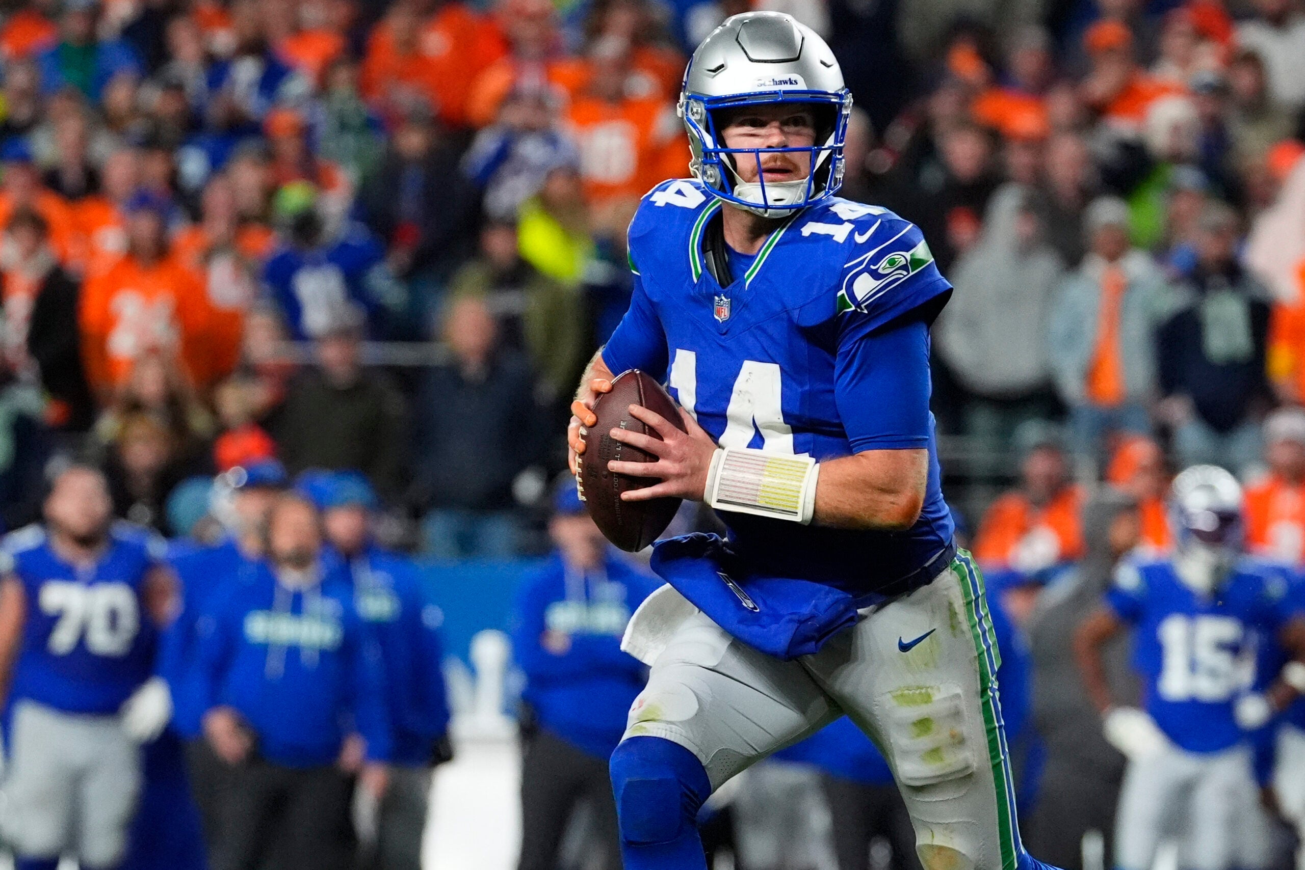 Oct 15, 2026; Denver, Colorado, USA; Seattle Seahawks quarterback Sam Darnold (14) looks to throw in the fourth quarter against the Denver Broncos at Empower Field at Mile High. Mandatory Credit: Ron Chenoy-Imagn Images