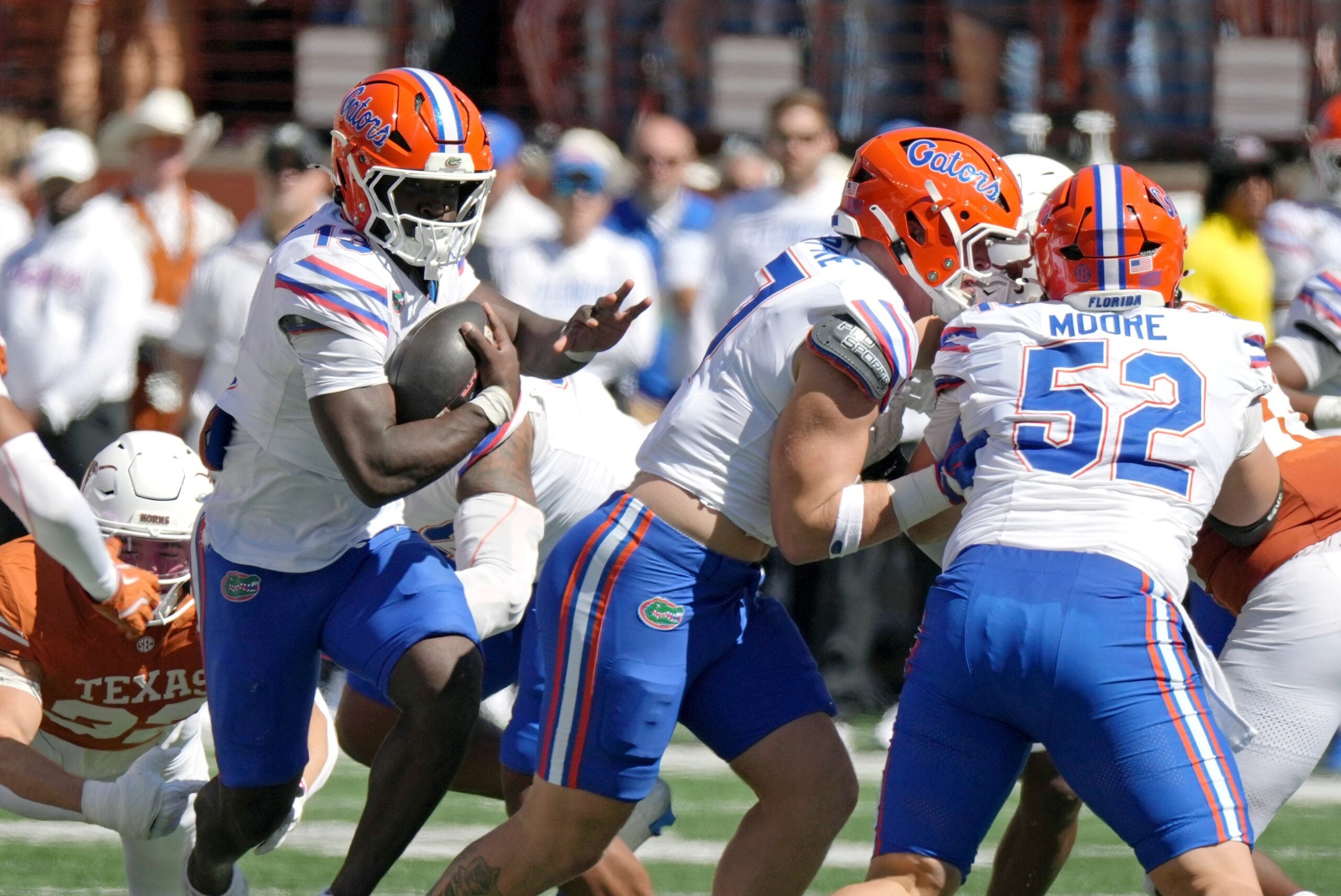 Oct 17, 2026; Austin, Texas, USA; Florida Gators running back Jadan Baugh (13) runs for yards during the first half against the Texas Longhorns at Darrell K Royal-Texas Memorial Stadium.