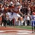 Oct 17, 2026; Austin, Texas, USA; Texas Longhorns wide receiver Cam Coleman (8) and quarterback Arch Manning (16) react after Coleman caught a touchdown pass from Manning during the second half against the Florida Gators at Darrell K Royal-Texas Memorial Stadium.