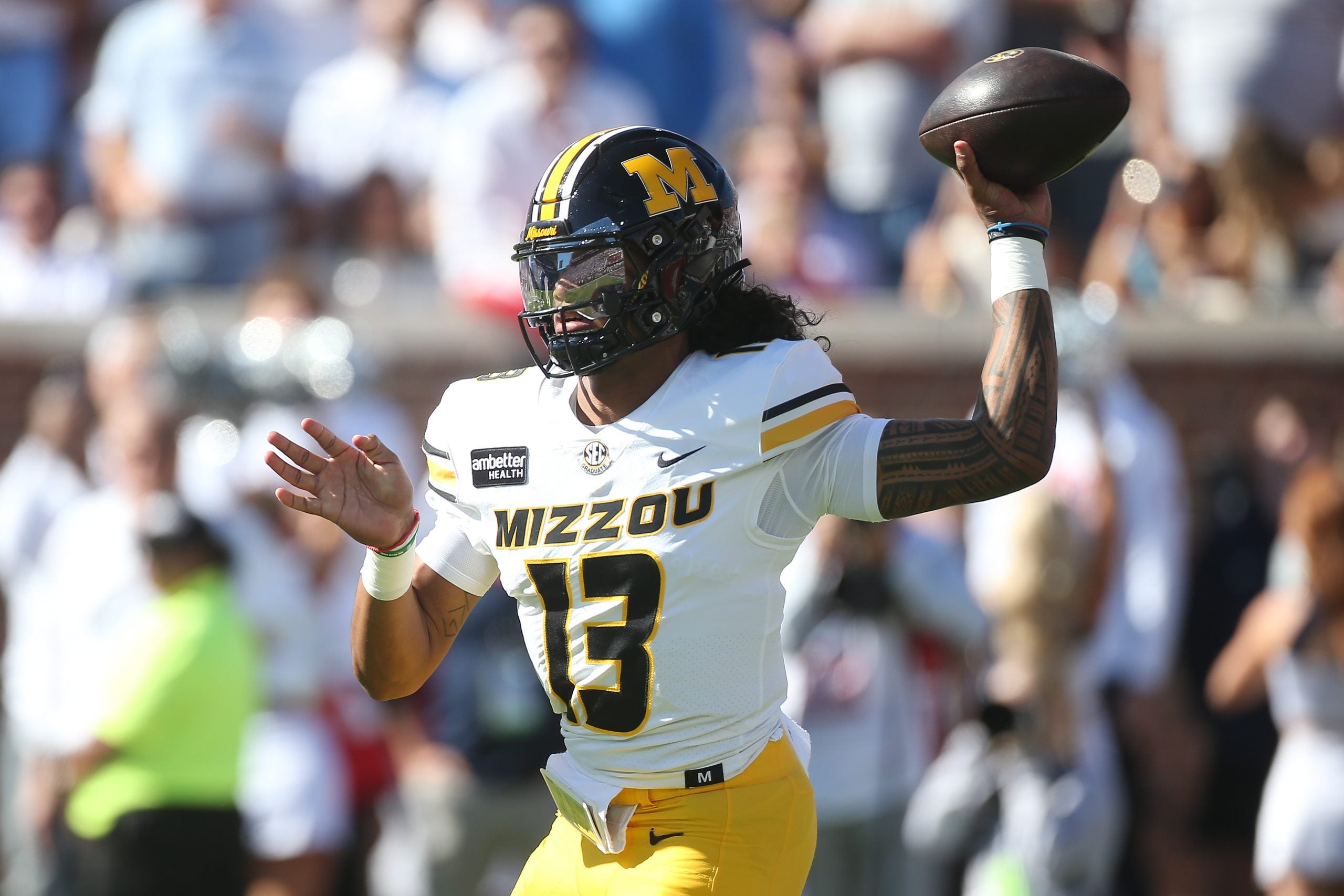 Oct 17, 2026; Oxford, Mississippi, USA; Missouri Tigers quarterback Austin Simmons (13) throws a pass during the first quarter against the Mississippi Rebels at Vaught-Hemingway Stadium.