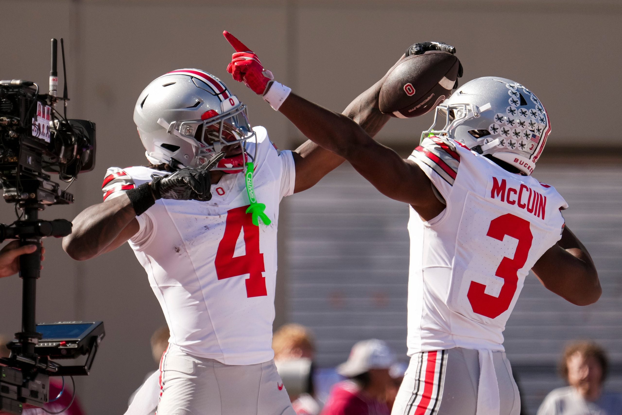 Ohio State Buckeyes wide receiver Jeremiah Smith (4) celebrates a touchdown with with wide receiver Devin McCuin (3) during the NCAA football game against the Indiana Hoosiers at Memorial Stadium Stadium in Bloomington, Ind. on Oct. 17, 2026.