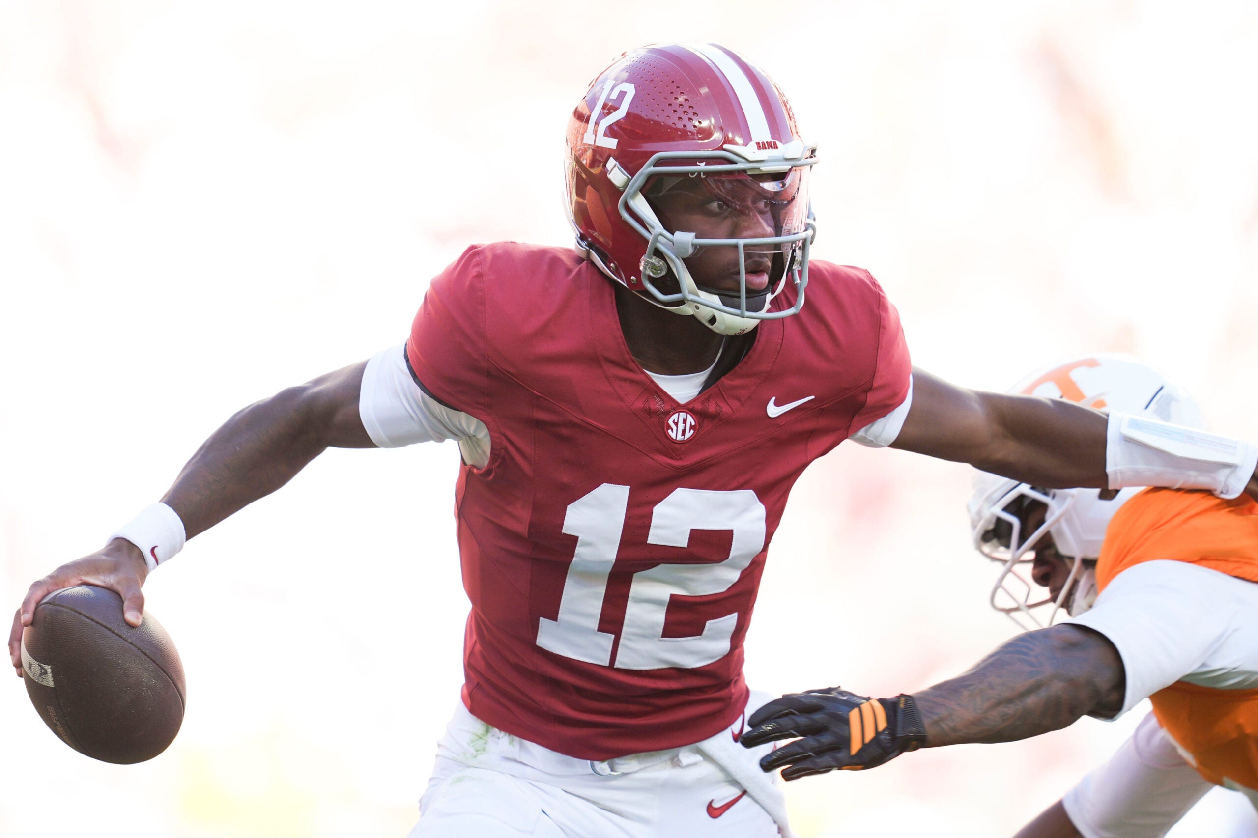 Alabama quarterback Keelon Russell (12) scrambles with the ball during a game between Tennessee and Alabama in Neyland Stadium in Knoxville, Tenn., Oct. 17, 2026.