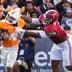 Alabama defensive lineman Devan Thompkins (1) holds onto Tennessee running back DeSean Bishop (18) during a football game between Tennessee and Alabama at Neyland Stadium in Knoxville, Tenn., on Oct. 17, 2026.