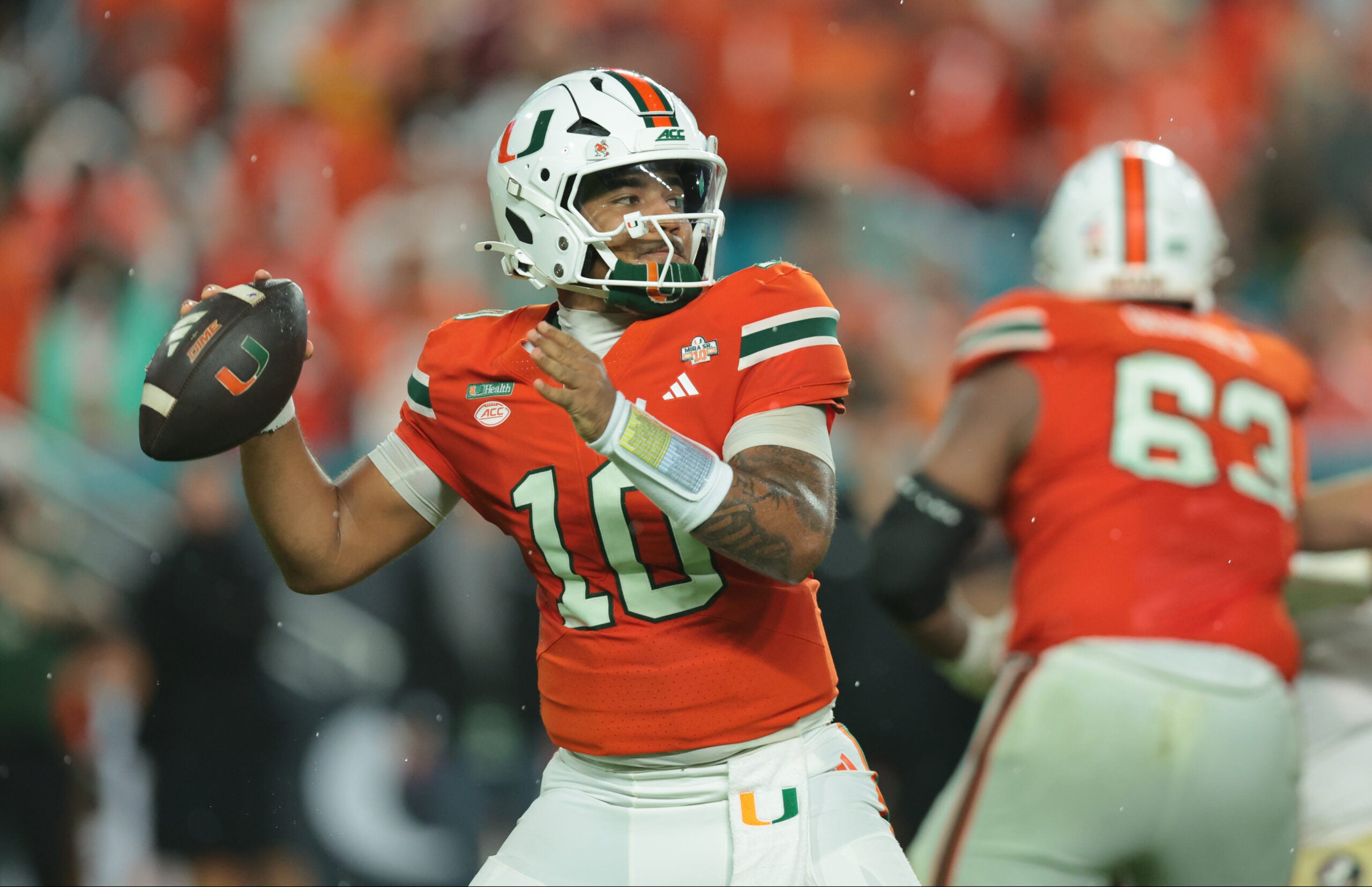 Oct 17, 2026; Miami Gardens, Florida, USA; Miami Hurricanes quarterback Darian Mensah (10) throws during the first half against the Florida State Seminoles at Hard Rock Stadium.